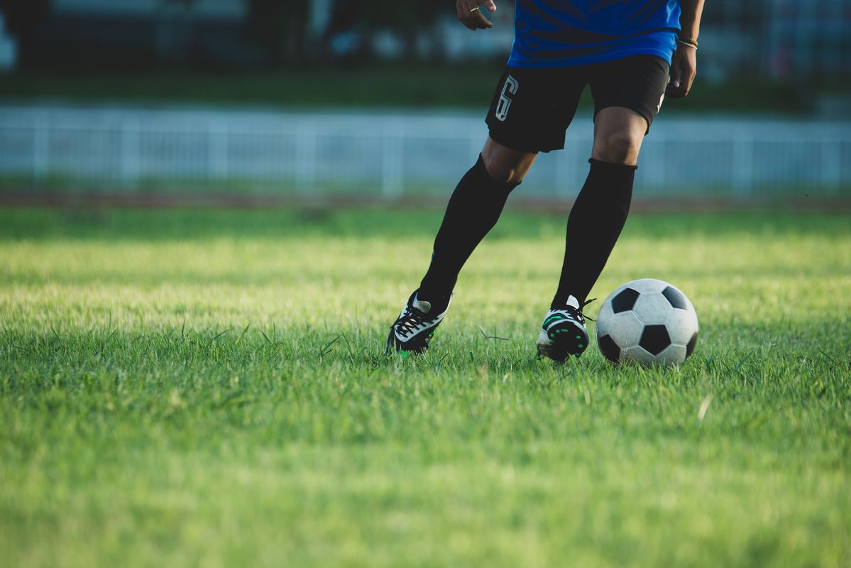 soccer player action on the stadium